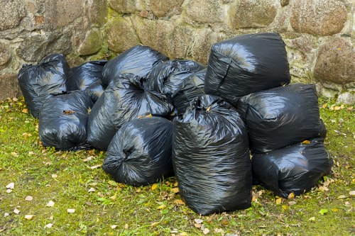 Garden waste being removed by experts in Shadwell